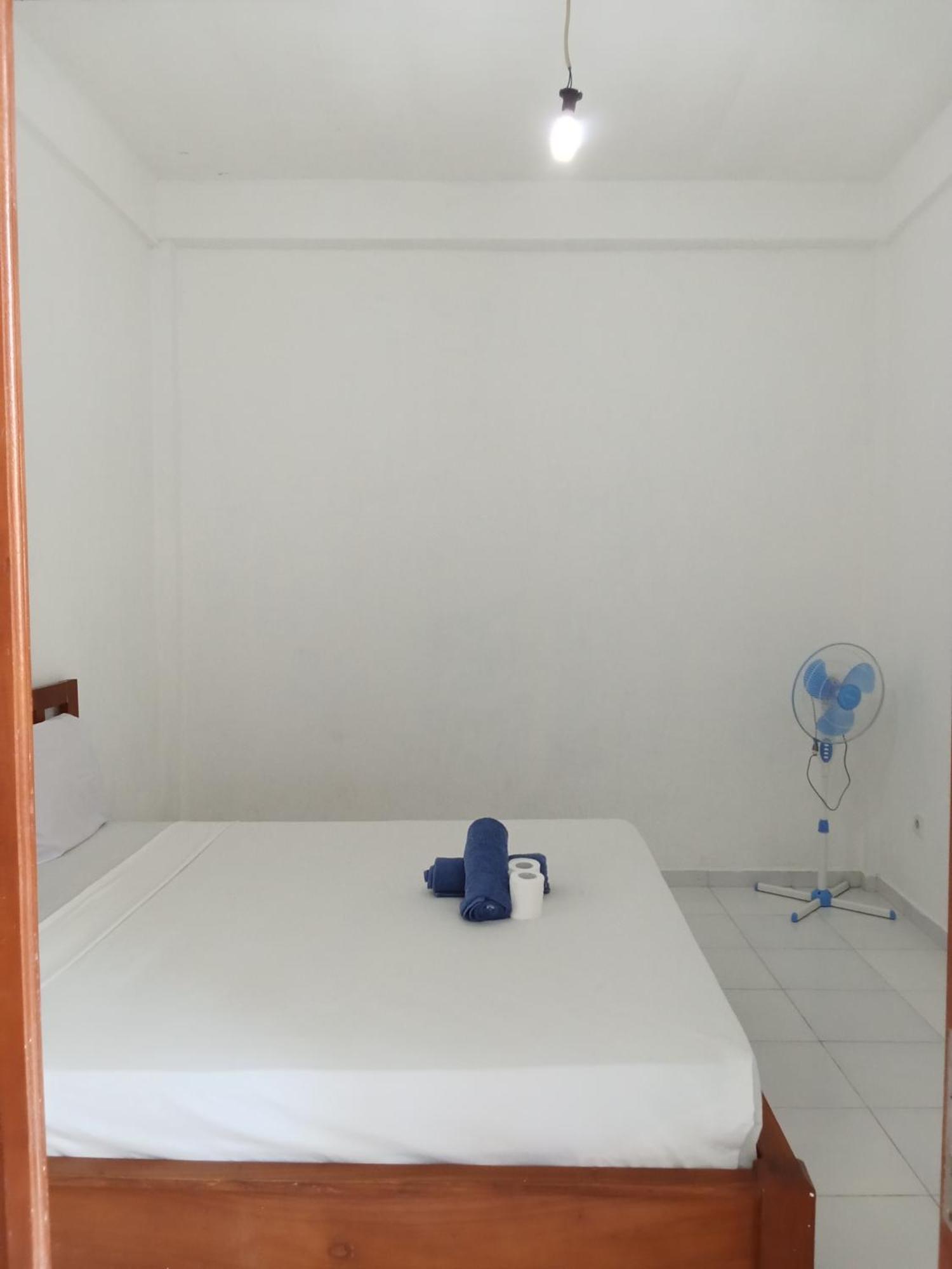 Komang Homestay Амед Экстерьер фото