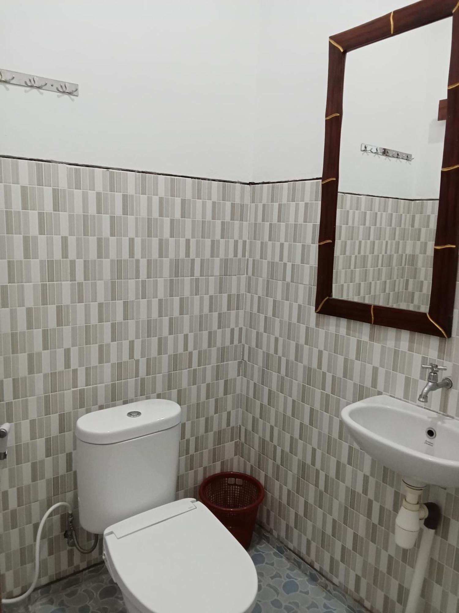 Komang Homestay Амед Экстерьер фото