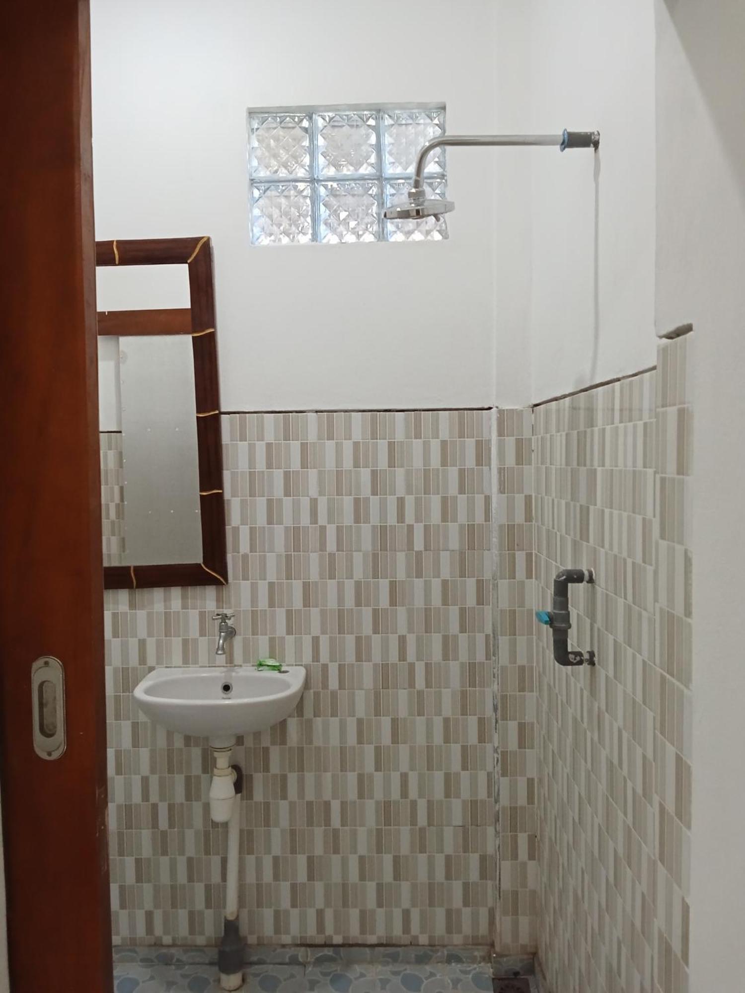 Komang Homestay Амед Экстерьер фото