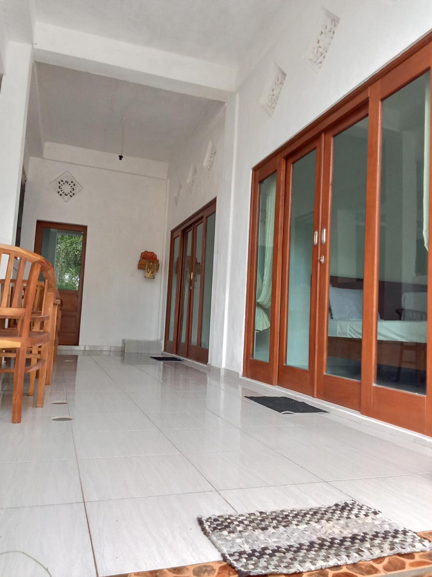 Komang Homestay Амед Экстерьер фото
