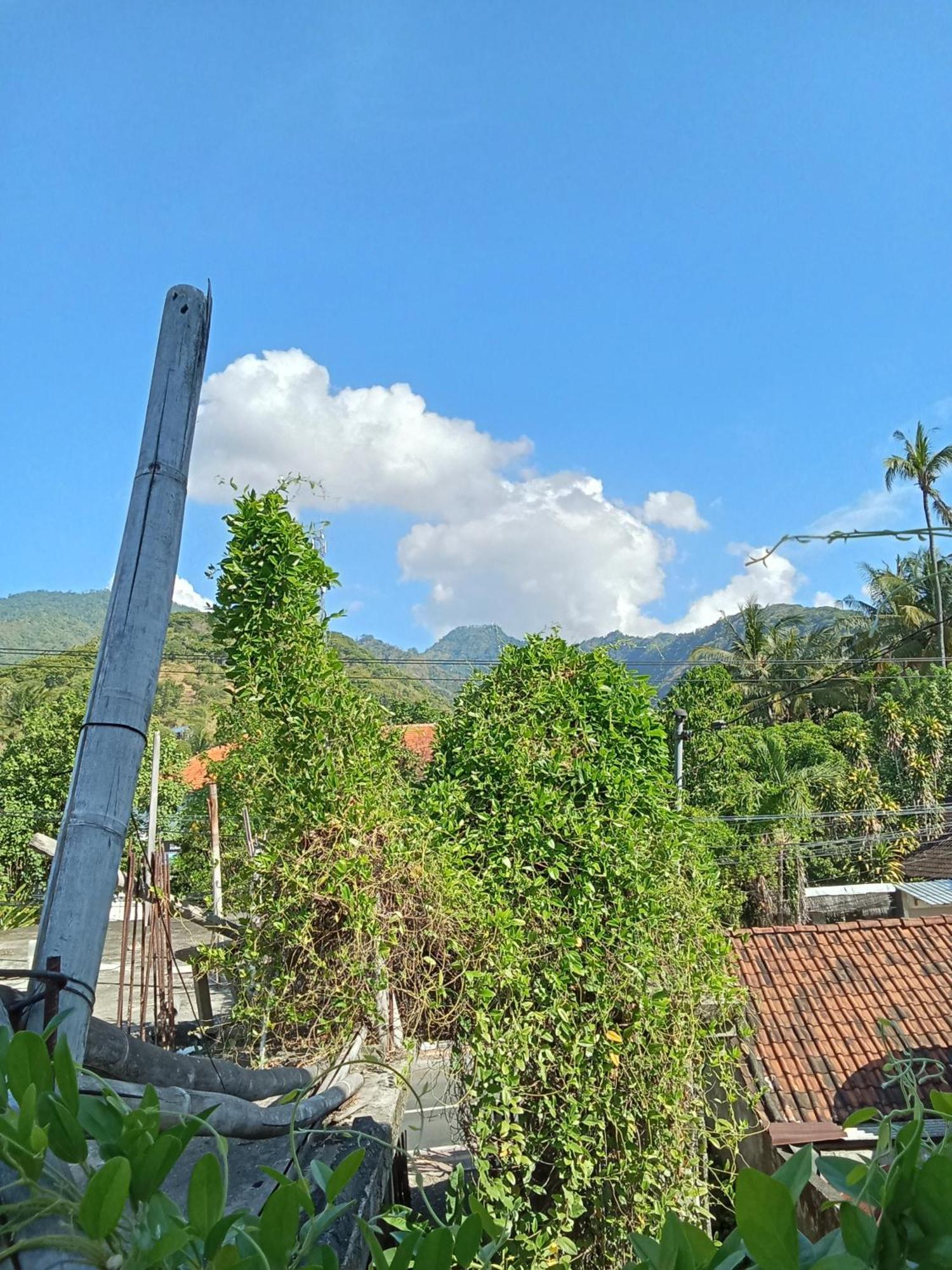 Komang Homestay Амед Экстерьер фото